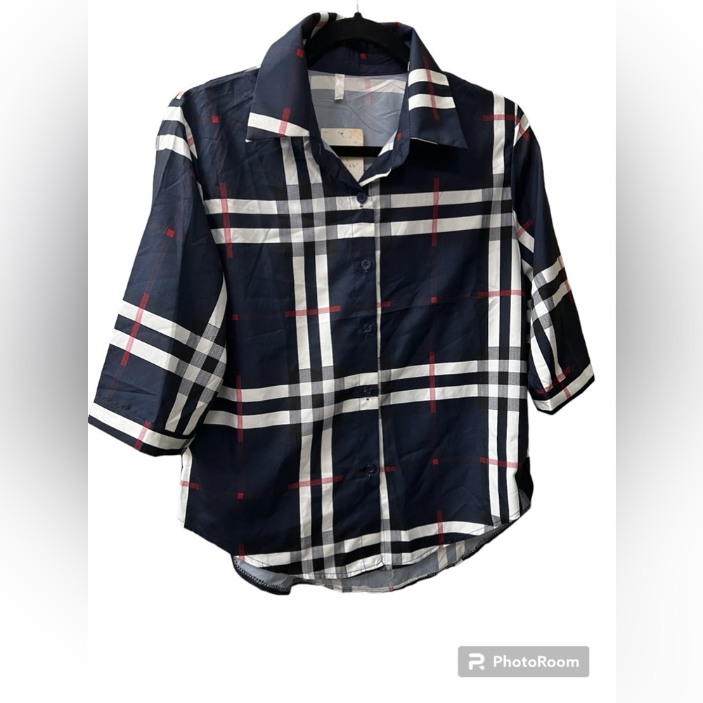 A classic plaid shirt you can wear with anything. NWOT
